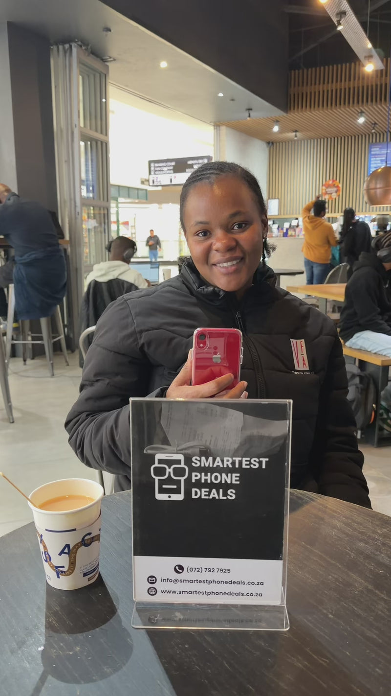Smartest Phone Deals customer with their iPhone
